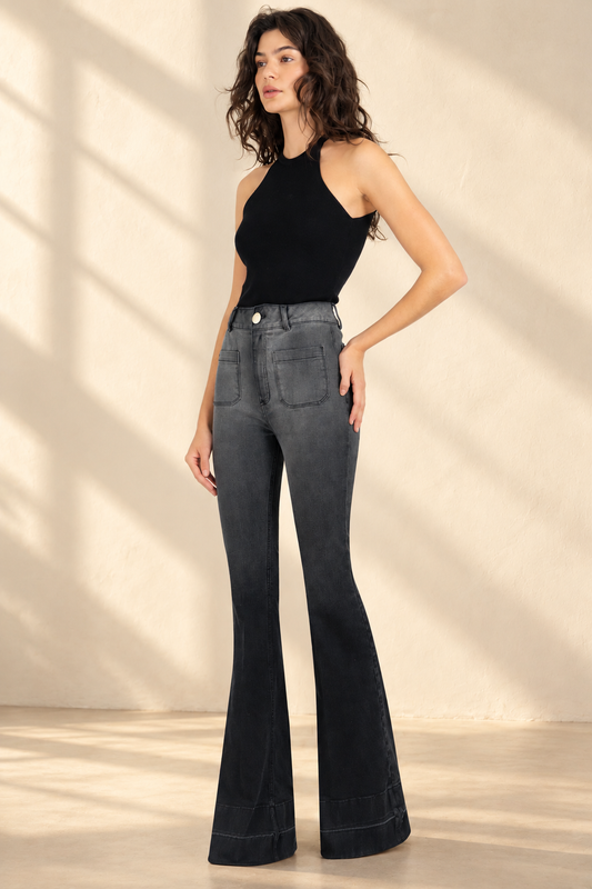 Doyenne degrade-black jeans in soft window light