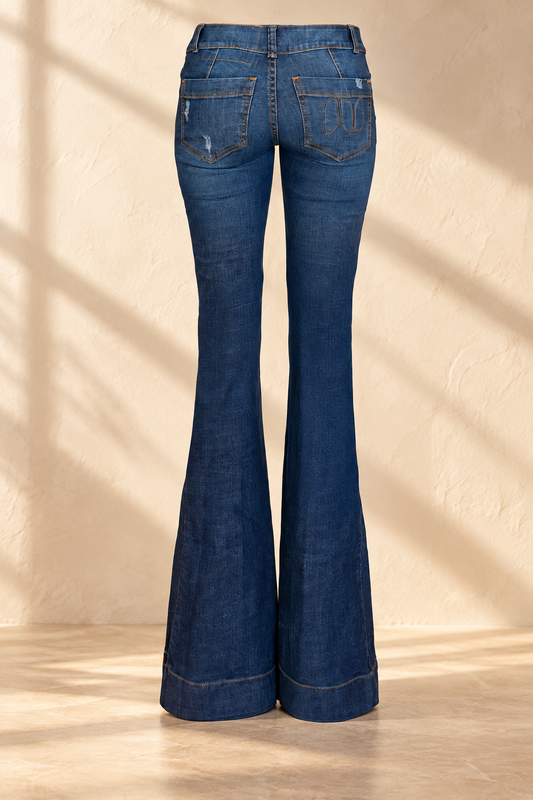 Doyenne distressed jeans in soft window light