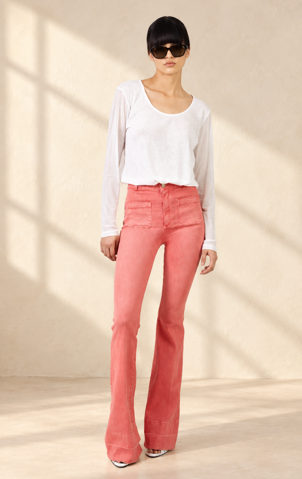 Doyenne poppy jeans in soft window light