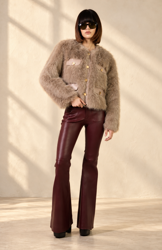 Doyenne wine jeans in soft window light